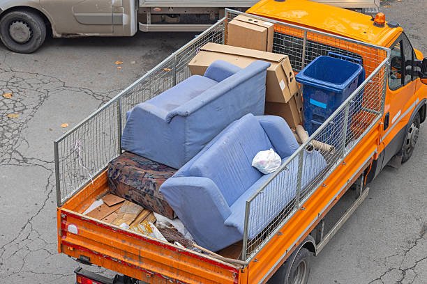 aerial view of old sofa discard furniture removal open truck